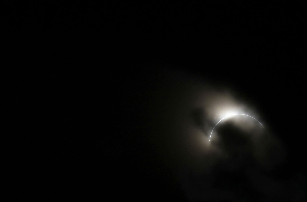 The moon blocks the sun seconds before a total solar eclipse at the remote Sibiloi National Park