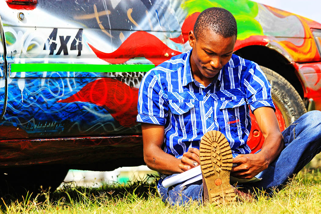 Sights & People from the North Rift_Rich boy sketching